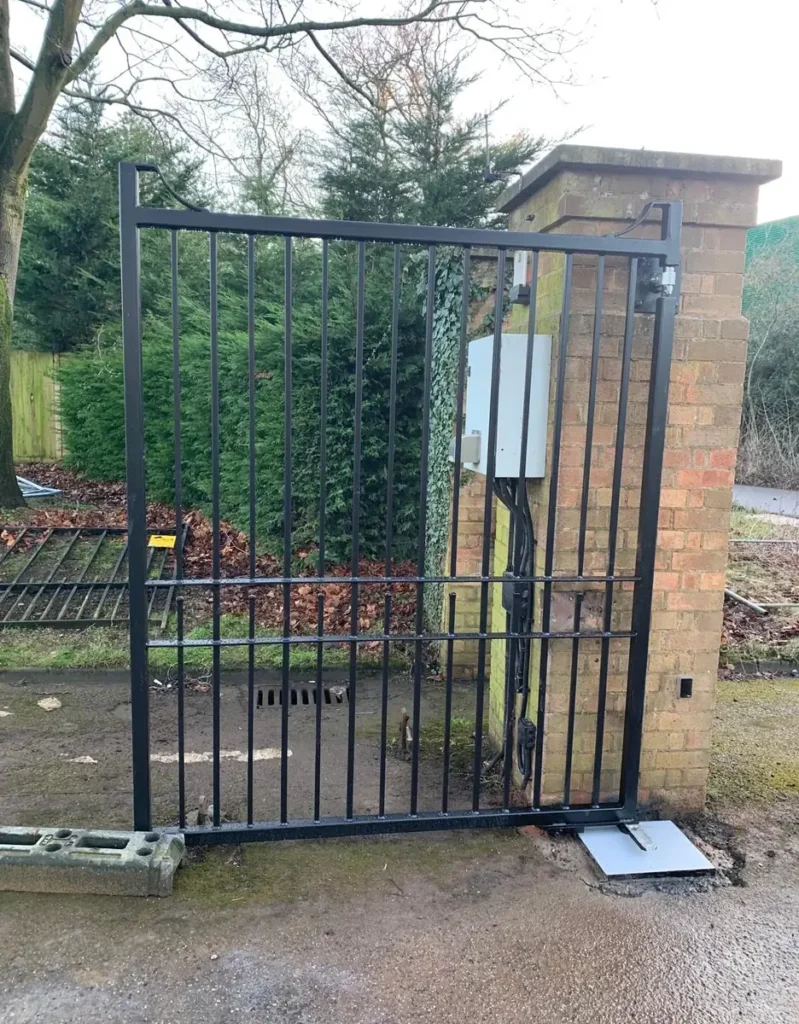 Powder-coated estate gates installed at a cemetery entrance