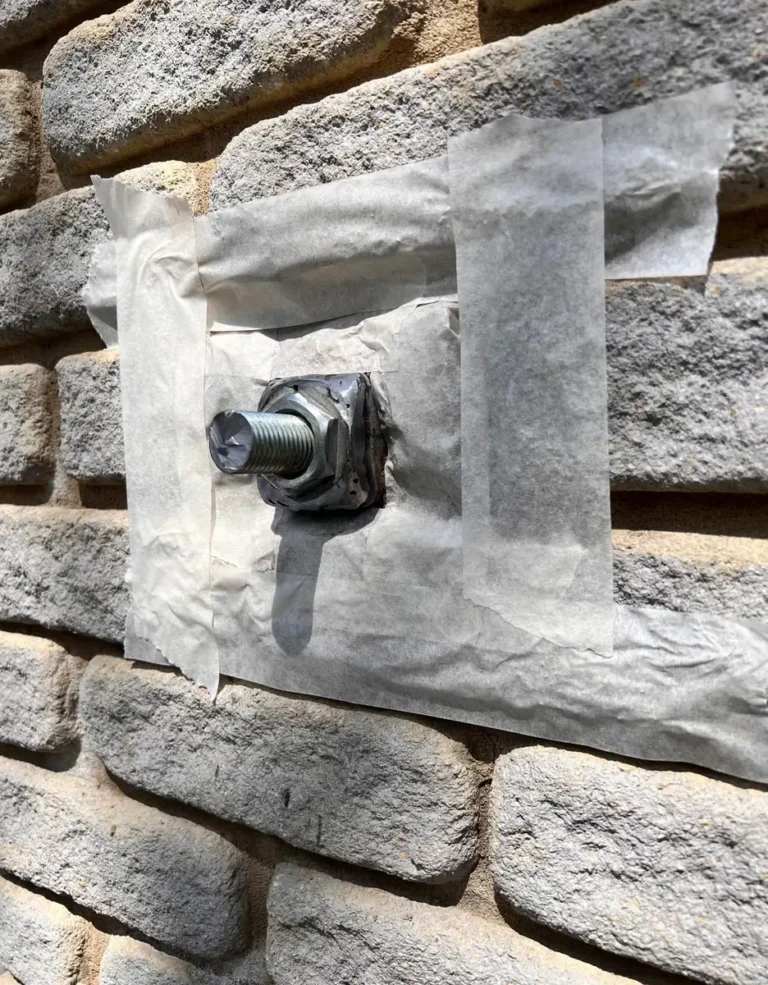A magnetic lock and keypad access control unit fitted to a gate pier