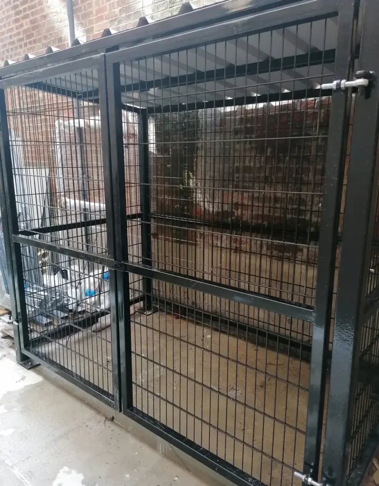A galvanised welded mesh security cage with a lockable access door