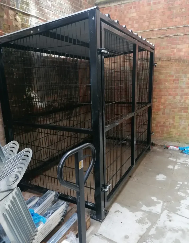 A welded mesh security enclosure protecting plant and cycle storage