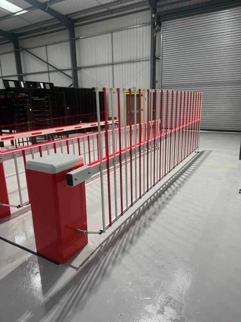 Hi-Bar automatic barriers with full-height skirts, assembled indoors